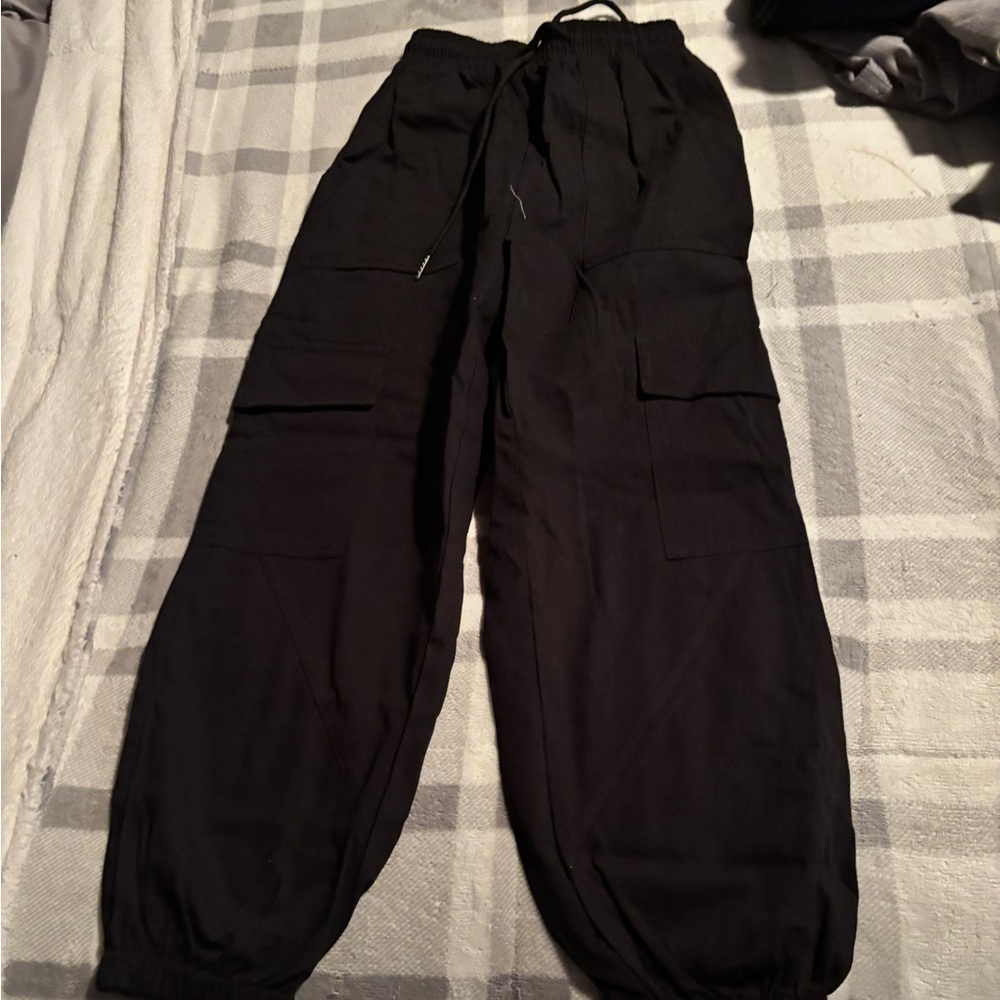 Cargo pants. Never worn. Smoke and bug free